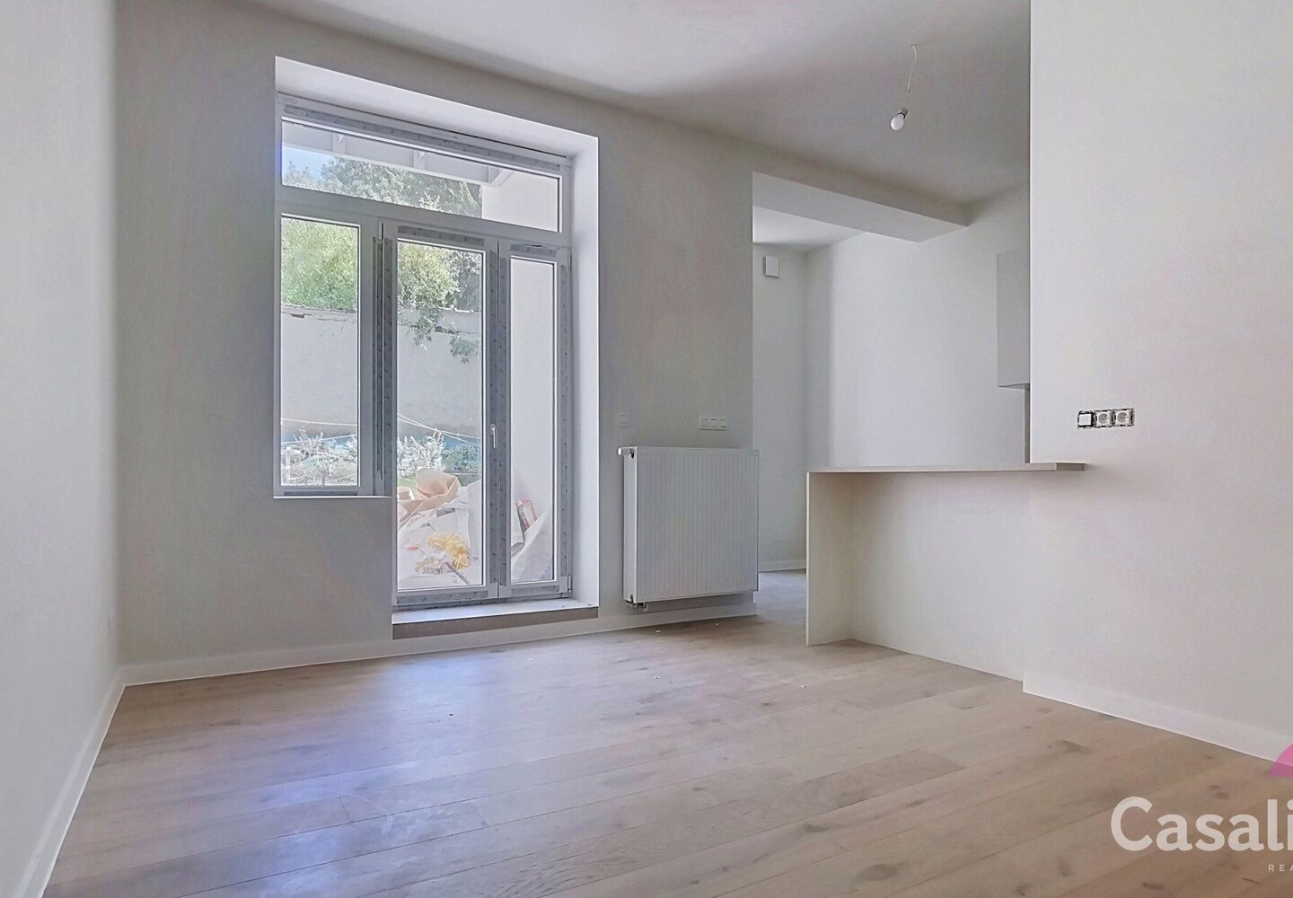 Gelijkvloerse verd. + tuin te koop in Schaarbeek